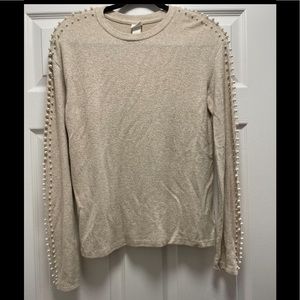 H&M thin, warm, beige pearl shirt.